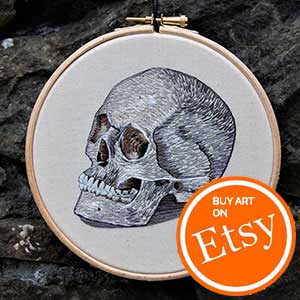 Detailed anatomical skull embroidery by Cath Janes