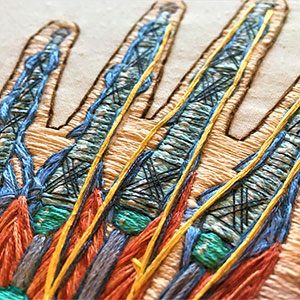  Hand embroidered anatomical art of the hand by Cath Janes